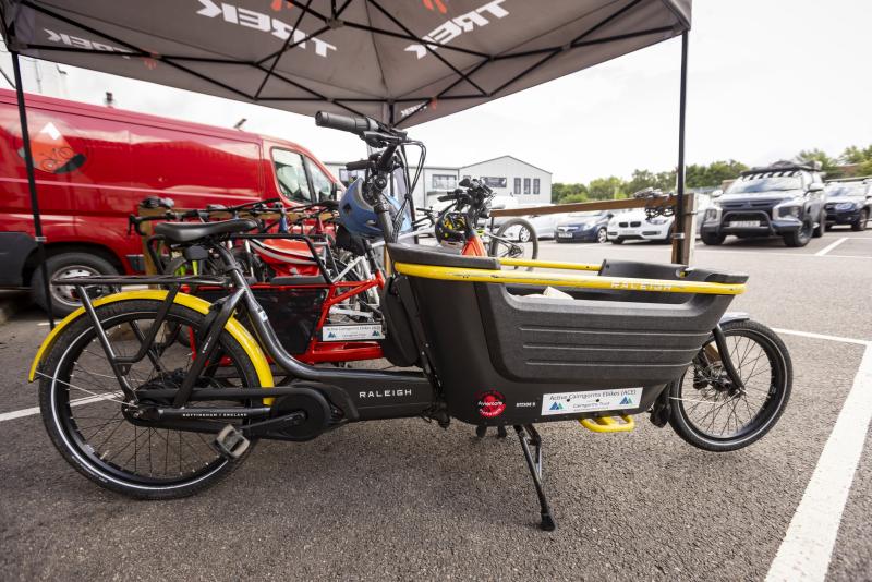 The cargo bike has a Cairngorms Trust Active Cairngorms eBikes sticker as it is one of the bike available for local residents to loan through the scheme.