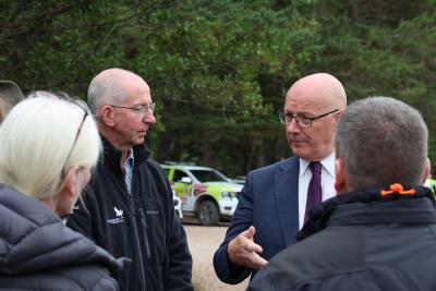 John Swinney MSP speaks to stakeholders at the site of the Glenmore wildfire