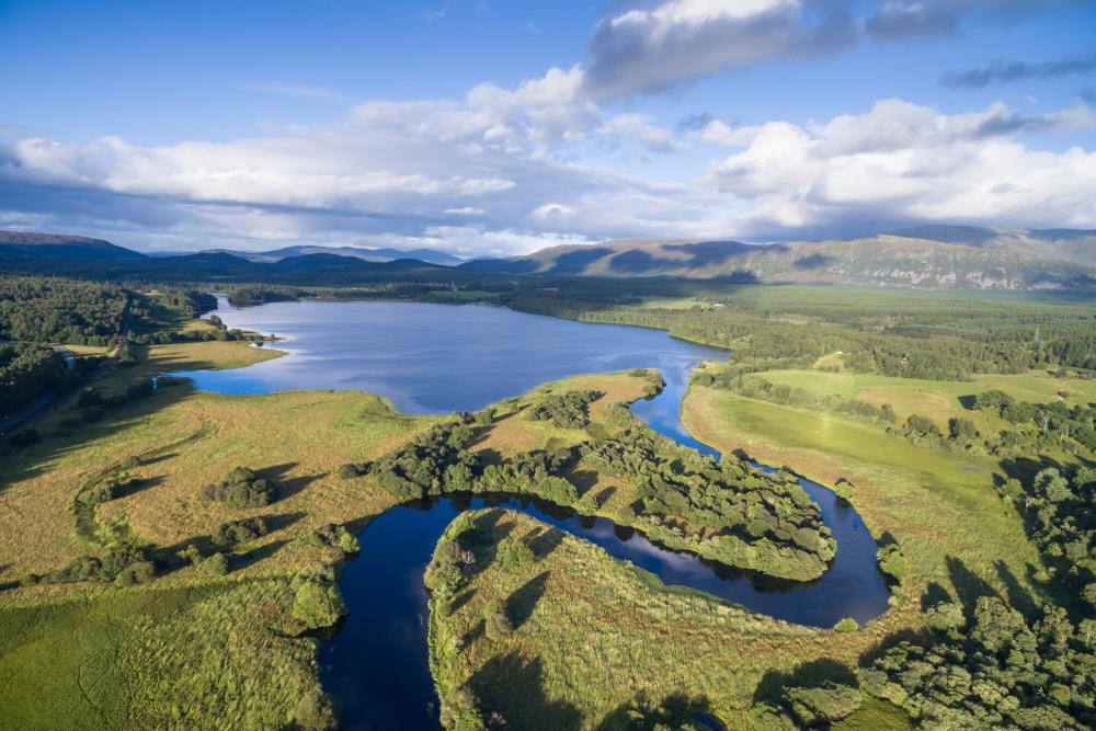 Aerial view of the river Spey flowing into Loch Insh.