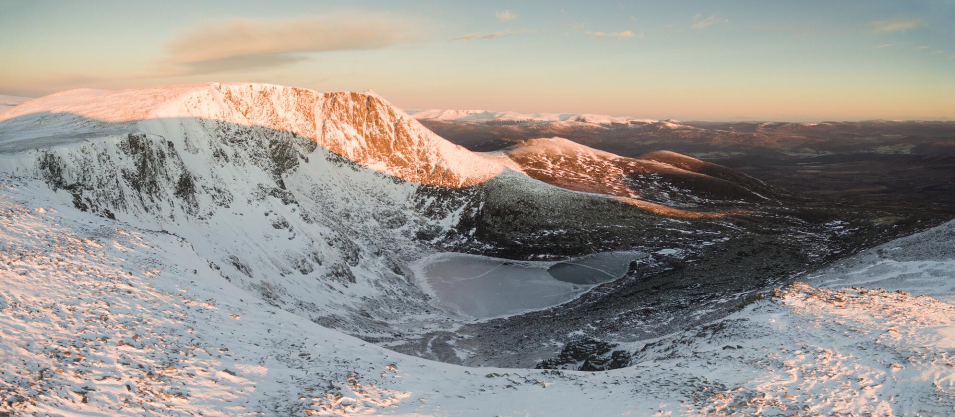 Early morning light strikes the West Buttress of Lochnagar in the Cairngorms National Park.