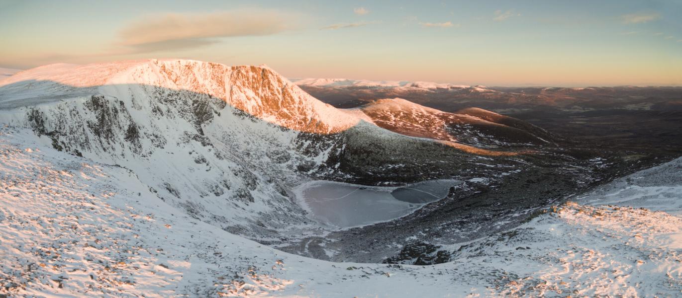 Early morning light strikes the West Buttress of Lochnagar in the Cairngorms National Park.