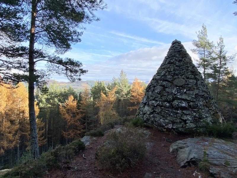 Balmoral cairns, stone structure surrounded by forest
