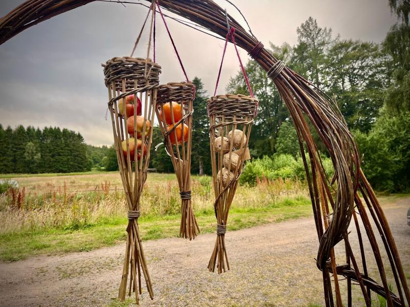 Three willow woven fatball holders