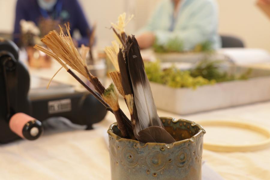 Feathers in a pot