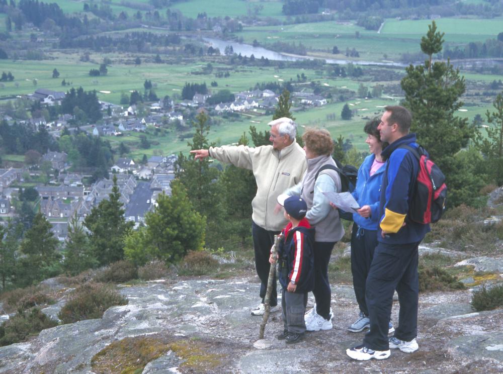 Family on top Craigendarroch above Ballater.