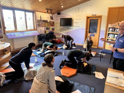Group of Junior Rangers taking part in first aid training