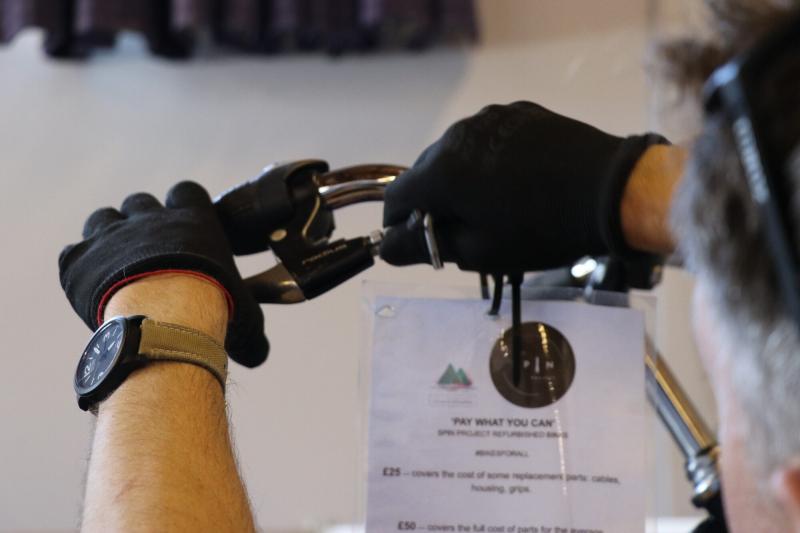 Close up of bike maintenance at a C2030 event in Carrbridge.