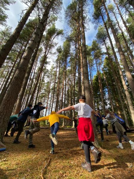 Junior rangers exercising in the forest