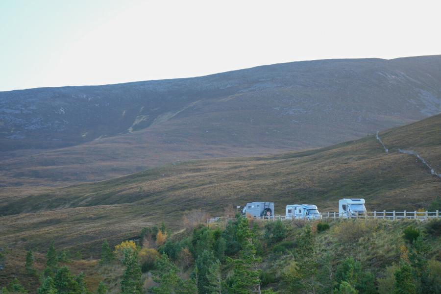 Campervans parked up at the Coire na Ciste car park on a cold October morning.