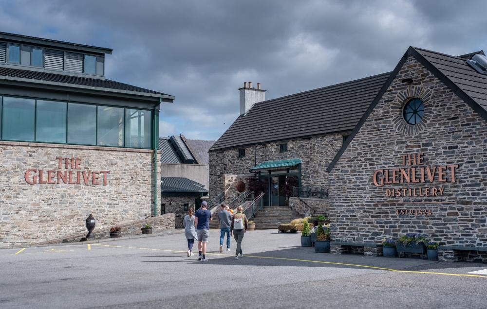 People going in to visit the Glenlivet distillery.