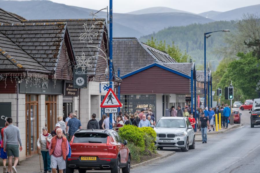 Aviemore main street, busy with pedestrians
