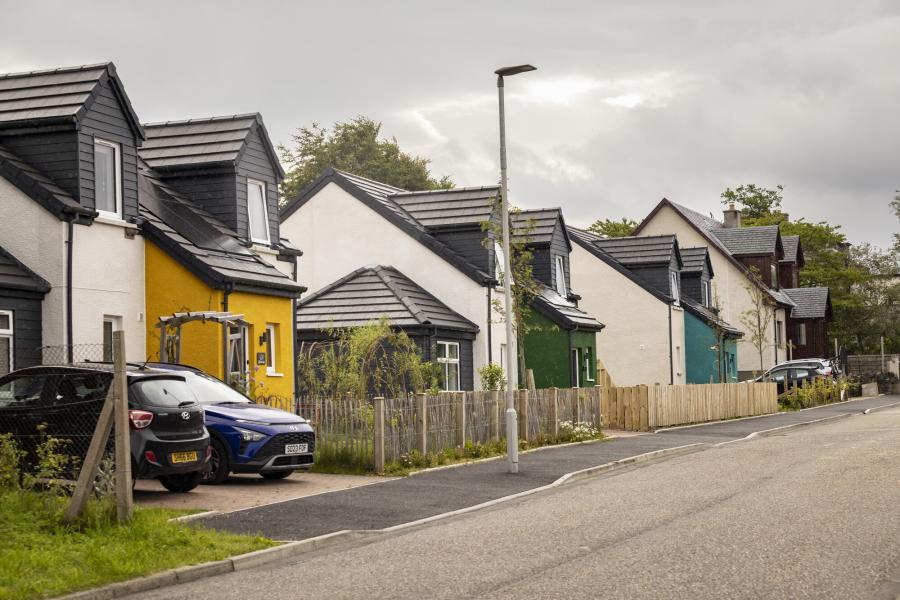 A residential street with modern affordable housing.