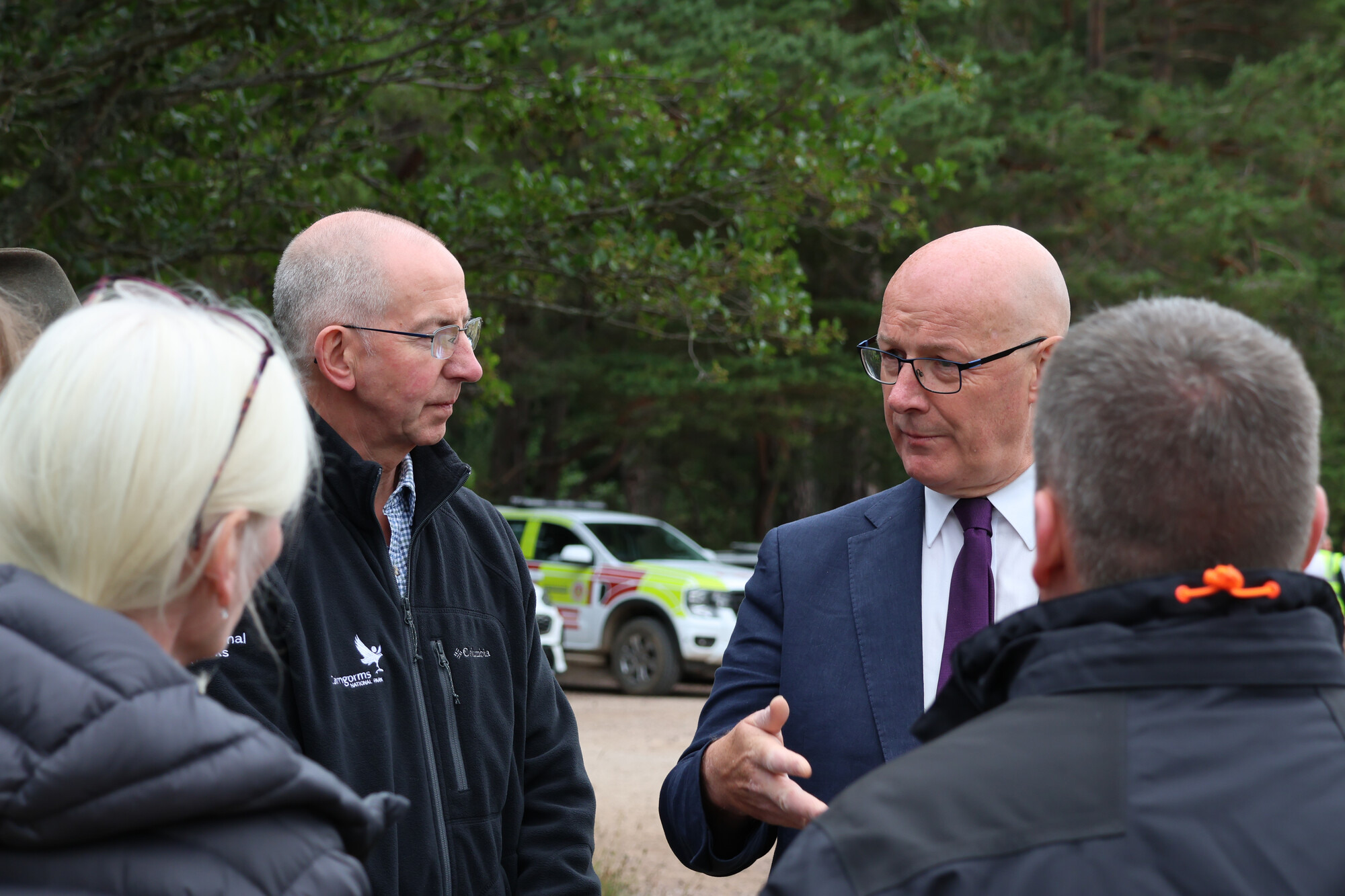 John Swinney MSP speaks to stakeholders at the site of the Glenmore wildfire