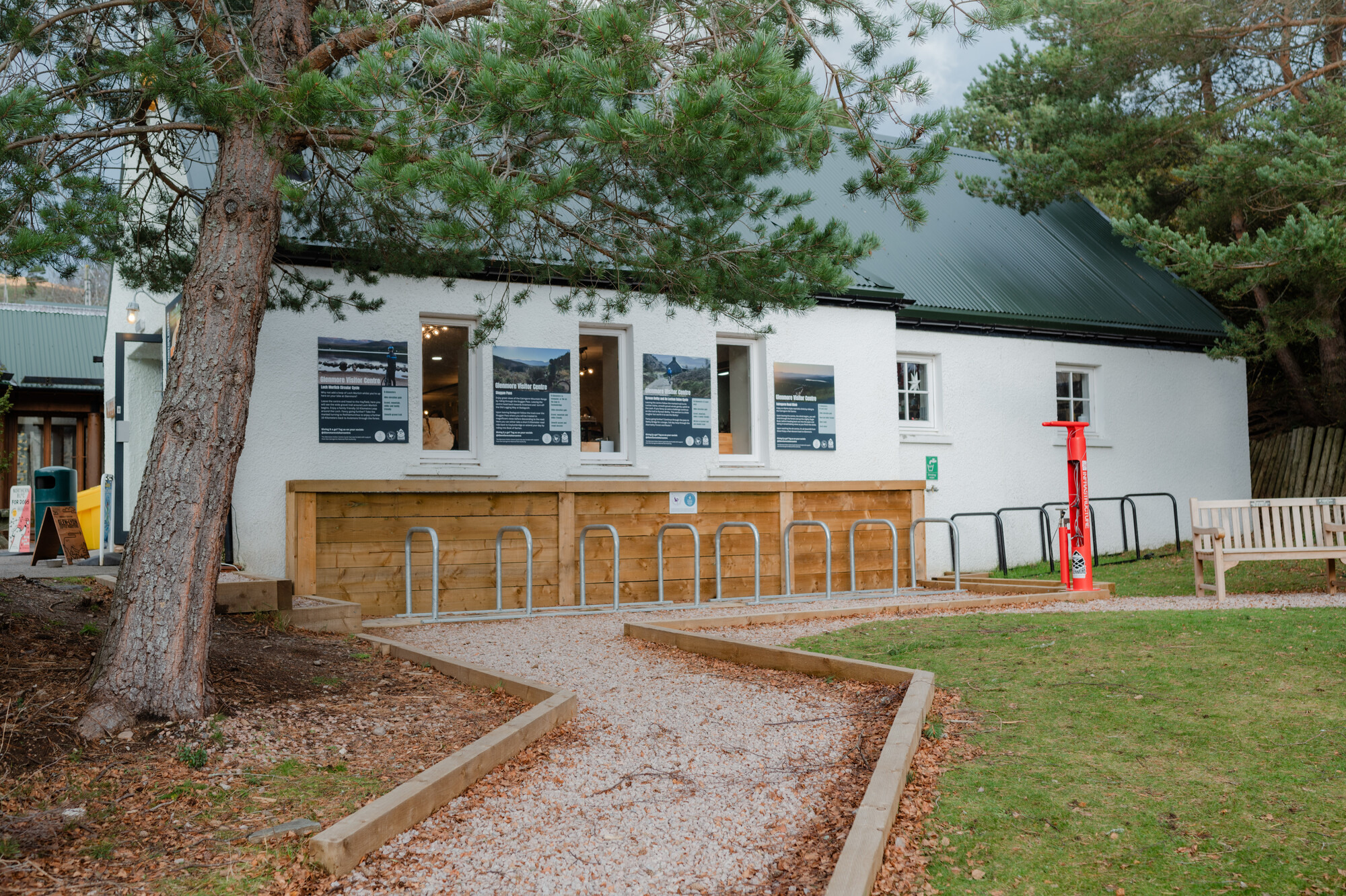 A row of bike stands outside the Allt Mor café, Glenmore