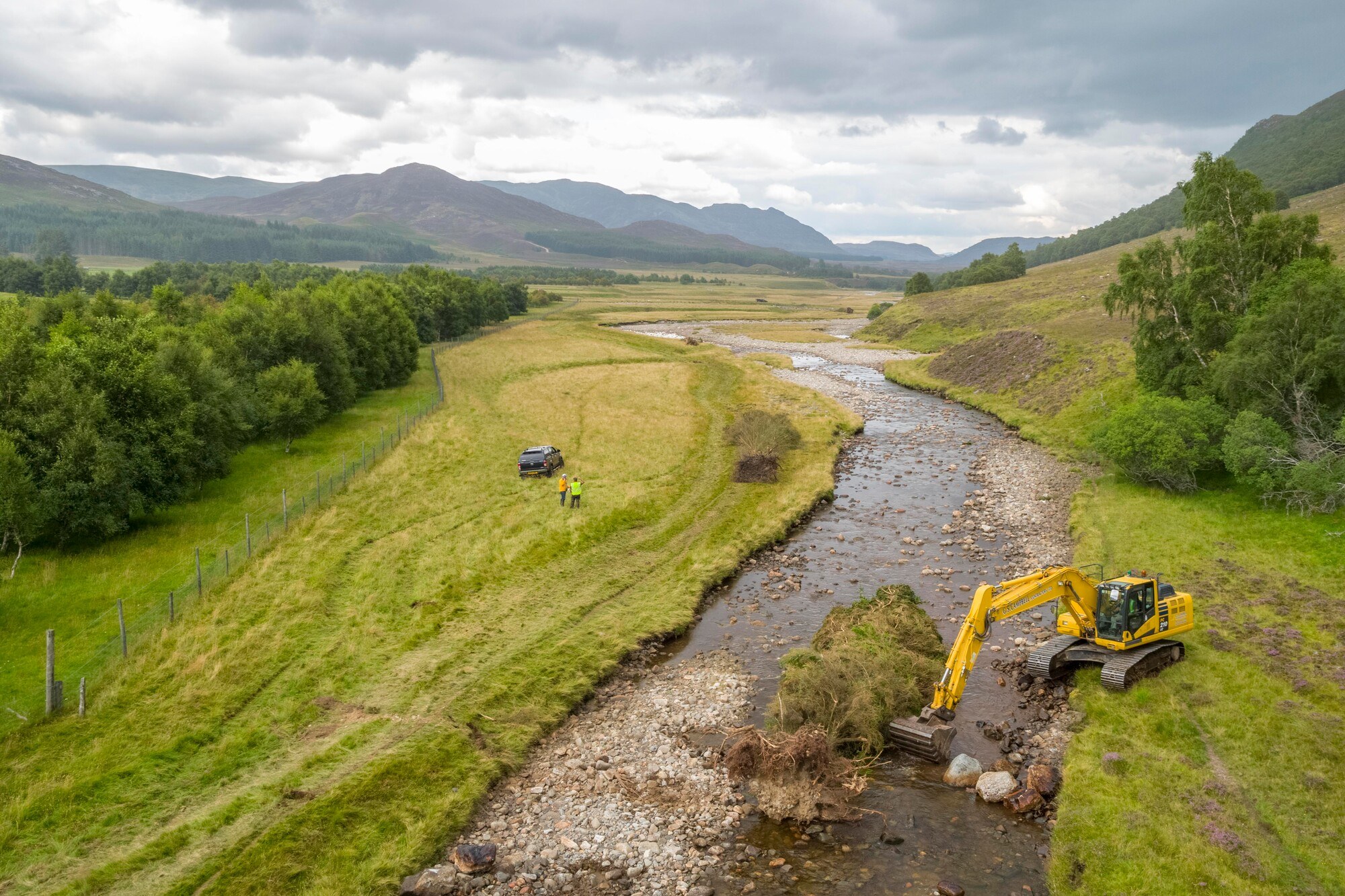 Aerial view of a digger working in the River Calder