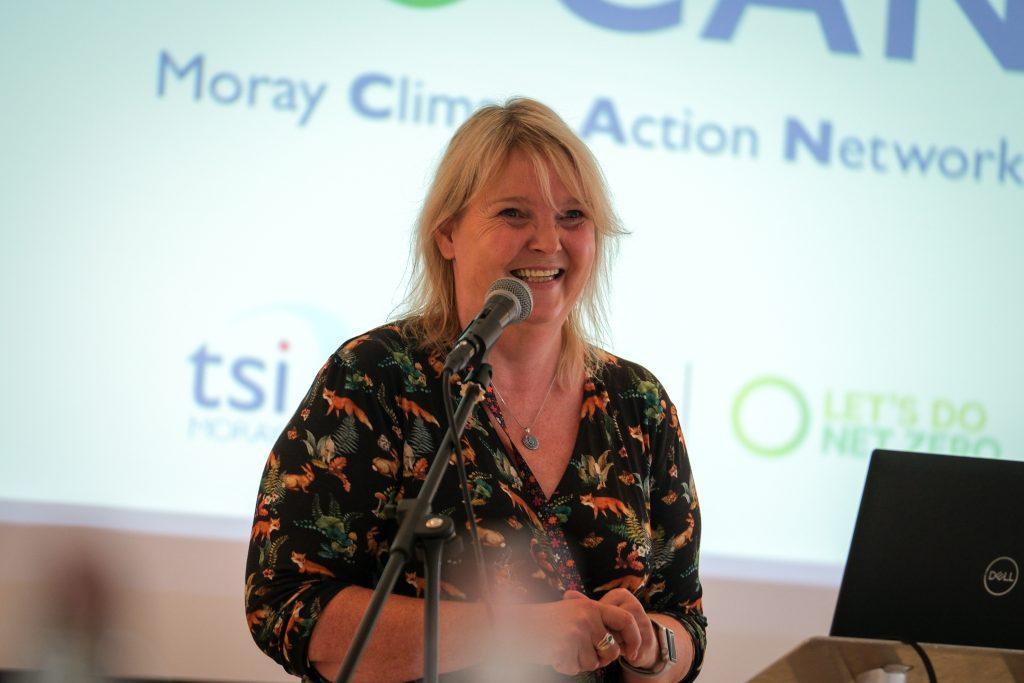 Louise Nicol talking on stage at the Moray CAN Conference.