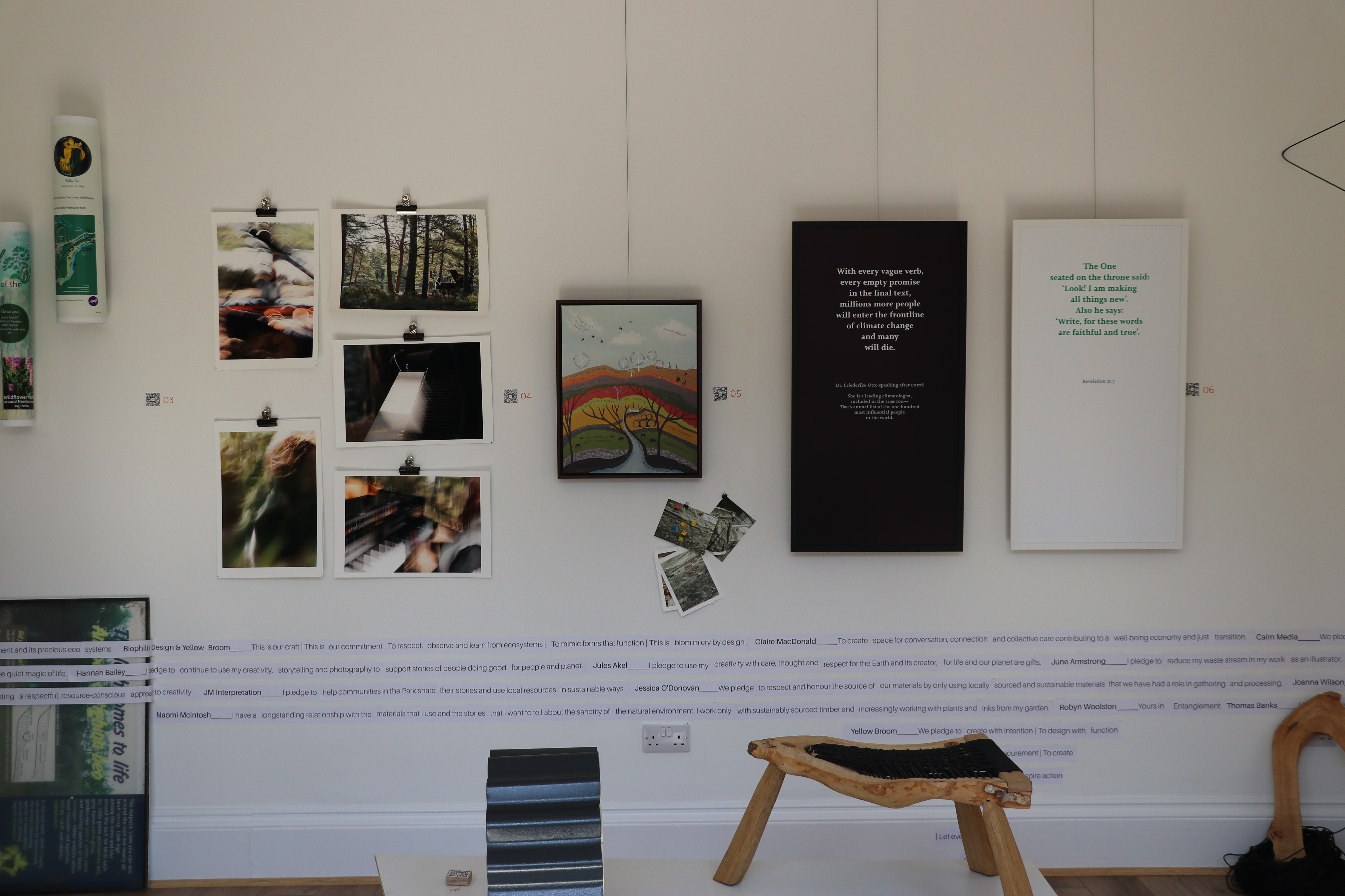 Various frames and arts hanging on the wall