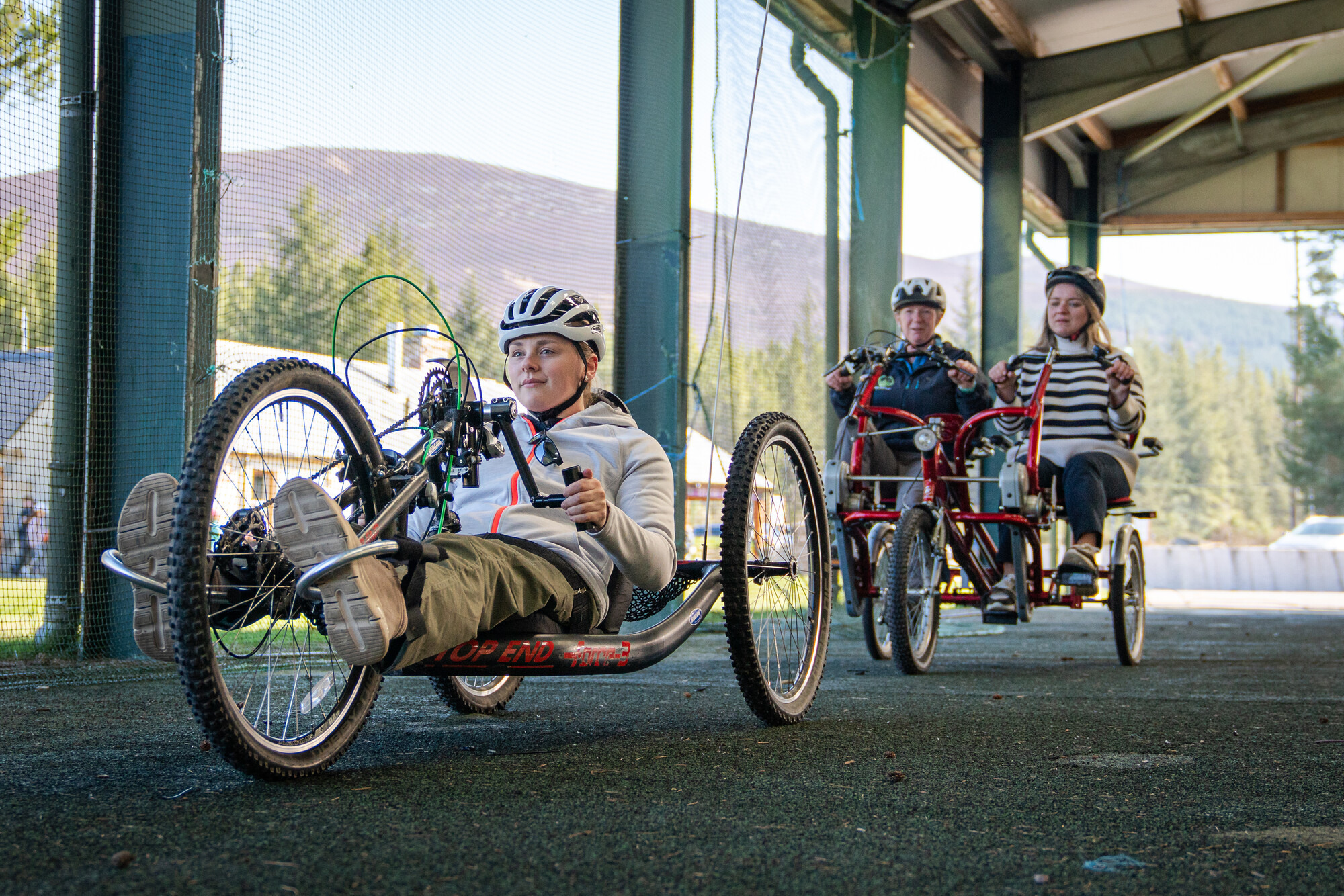 People using the adaptive bikes and all terrain wheelchairs that you can hire from Access Mhor at Badaguish.
