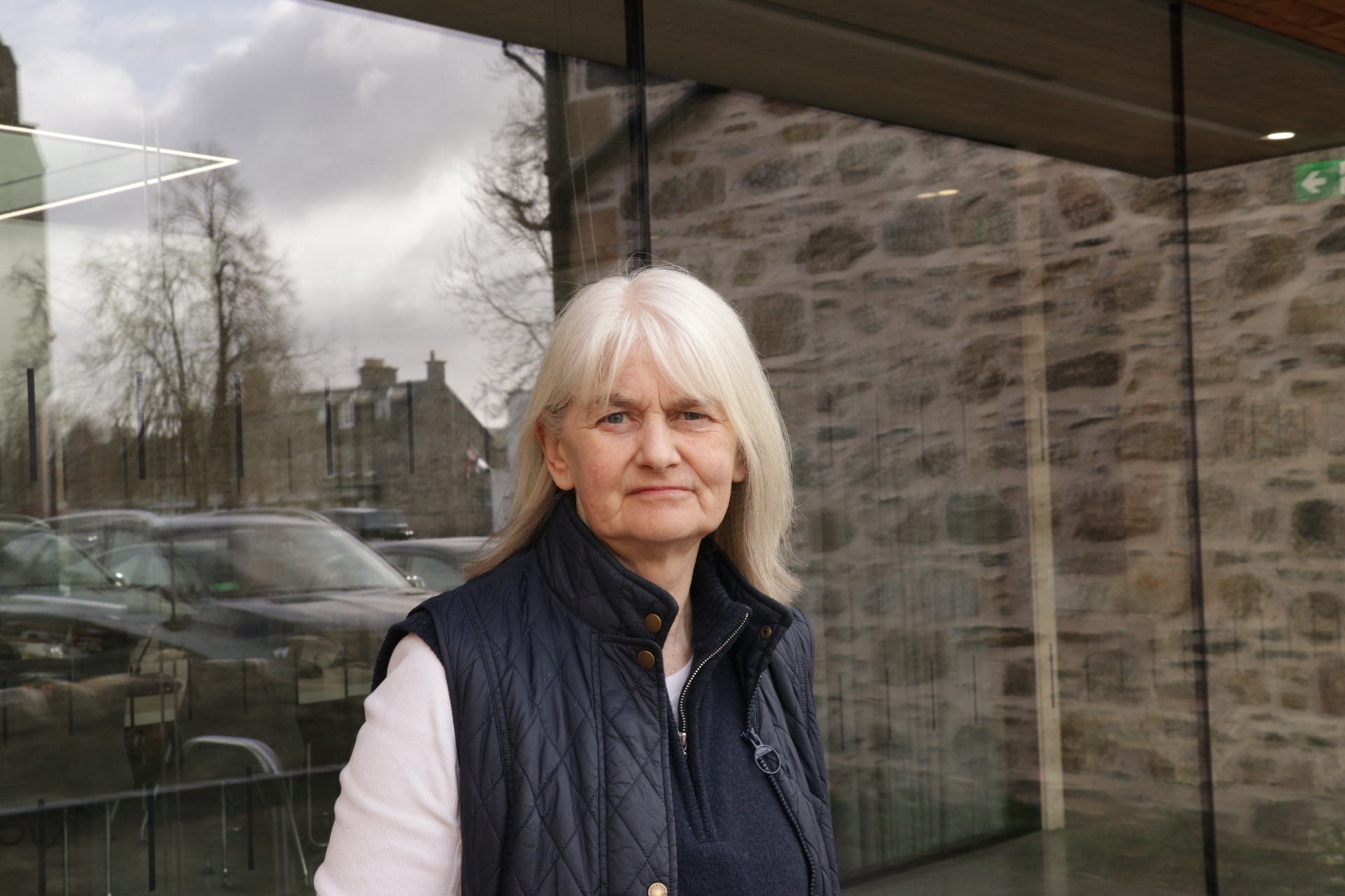 Eleanor looks to camera outside the Park Authority offices