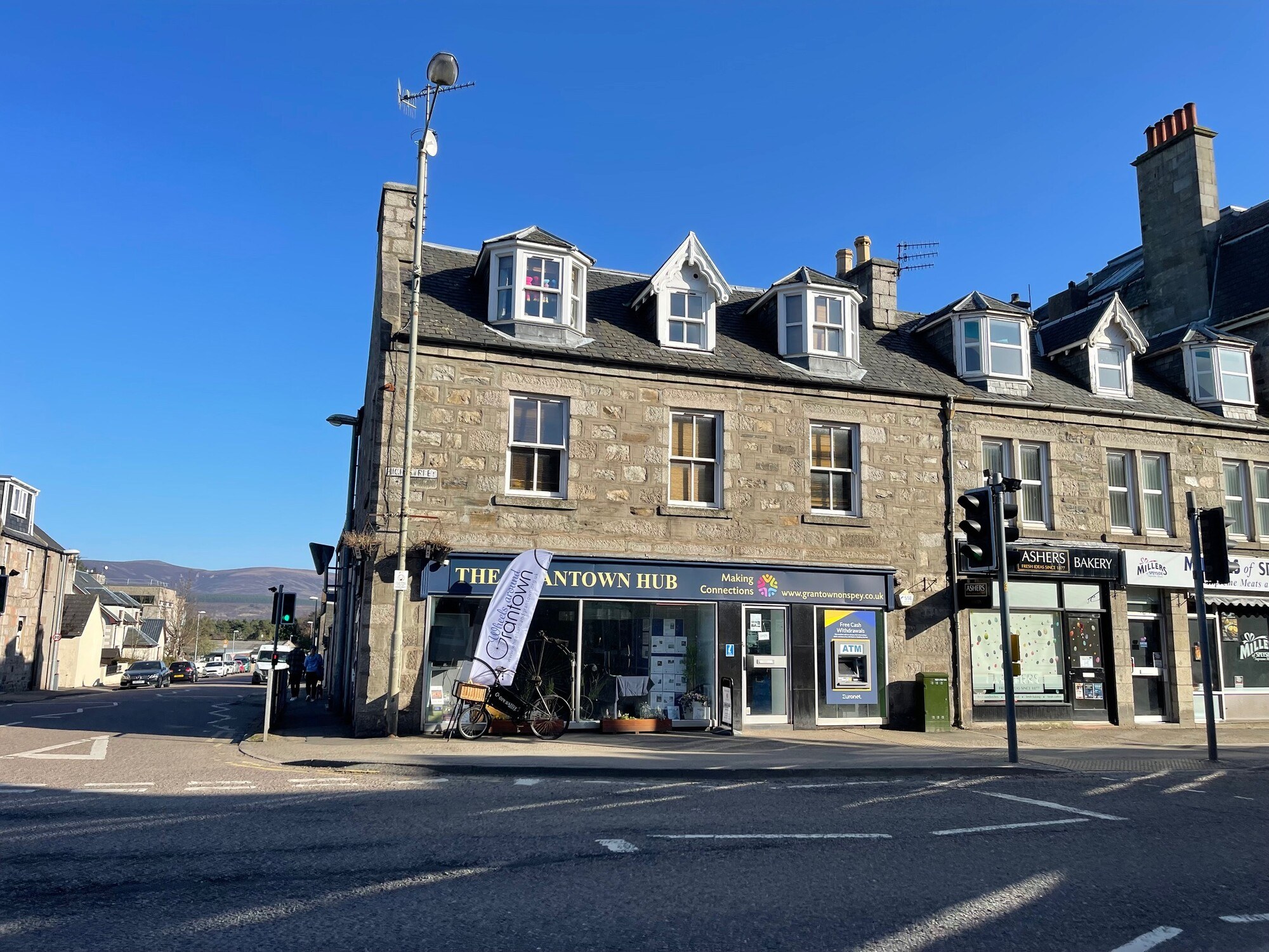 Looking across Grantown-on-Spey high street at the Grantown Hub.