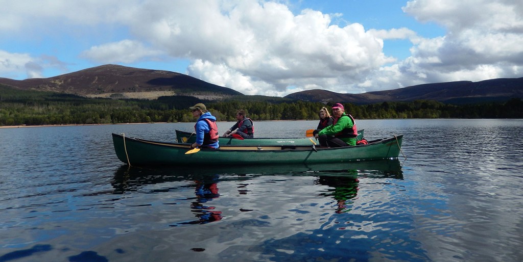 Canoeing on Loch Morlich looking to the Cairngorms