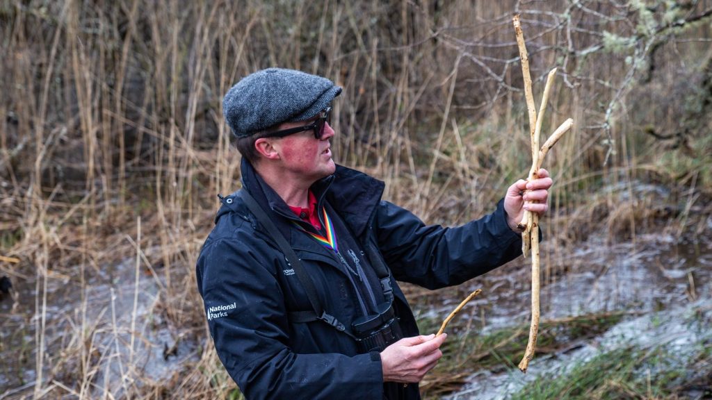 Photo of Jonathan Willet, taken at a board visit to a beaver site.